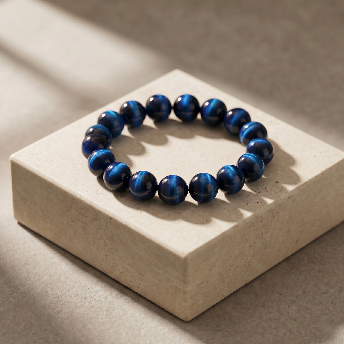 Gemini natural blue tiger's eye gemstone bracelet by The Aurae Studio, the ultimate healing crystal for Gemini spiritual growth.